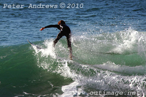 A mid August Saturday morning surf at Location 2, New South Wales Illawarra Coast, Australia. Photo copyright Peter Andrews.