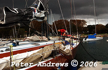 Crew on Infinity III preparing to leave the dock as a strong southerly front seen in the background approaches from down the coast.