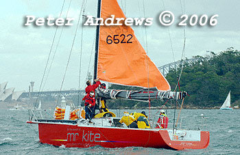 Buckland and Hunn's Mr Kite 40 Mr Kite, showing their storm sails to the committee boat for the 2006 Sydney to Gold Coast Yacht Race.