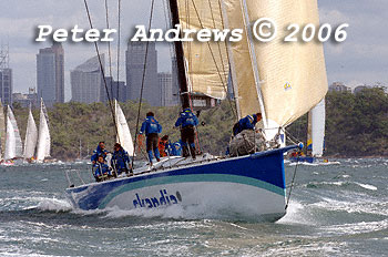 Grant Wharington's 98 foot IRC Maxi Skandia leads the fleet out of the harbour after the 2006 Sydney to Gold Coast Yacht Race.