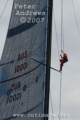 Man aloft on Bob Oatley's Wild Oats.