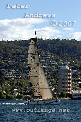 Ichi Ban off Sandy Bay with the Hobart Casino in the background.