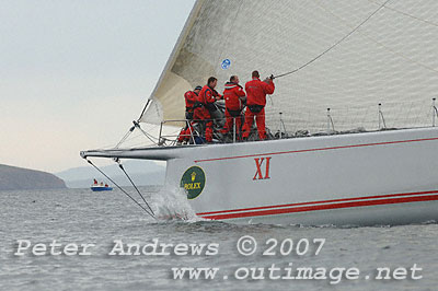 Crew on the bow preparing for one of the many sail changes needed to get through the fickle conditions that come with the Derwent River.