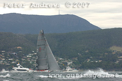Bob Oatley's Wild Oats approaching the Hobart finishing line in the 2007 Rolex Sydney Hobart Yacht Race.