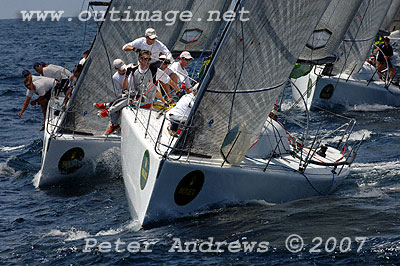 Marcus Blackmore's Farr 40 Hooligan approaching the top mark on day 1 of the Rolex Trophy One Design Series with Matt Allen's Farr 40 Ichi Ban close behind.