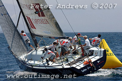 Vincenzo Onorato's Mascalzone Latino rounding the bottom gate for their second work up to the top mark in Race 1