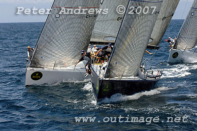 Lang Walker's Kokomo approaching the top Mark with Ivan Wheen's Sputnik close behind and just outside and Brett Neill's White Cloud in the background, during the 2007 Rolex Trophy One Design Series. Photo copyright Peter Andrews.