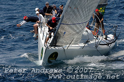 Brett Neill's White Cloud about to round the top mark.