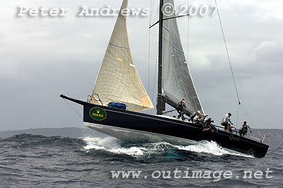 Bob Steel's Quest running along the top of a large wave.