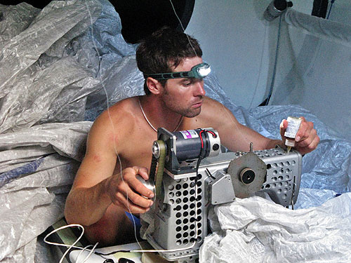 Bowman / Trimmer, Daryl Wislang repairs sails below decks on Telefonica Blue on leg 1 of the Volvo Ocean Race. Photo copyright Gabriele Olivo - Equipo Telefonica. 