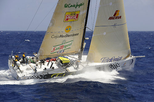 Telefonica Black passes through the scoring gate at Fernando de Noronha, on leg 1 of the Volvo Ocean Race. Photo copyright Rick Tomlinson - Volvo Ocean Race.