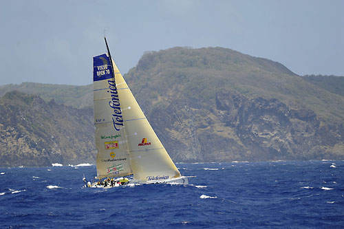 Telefonica Black passes through the scoring gate at Fernando de Noronha, on leg 1 of the Volvo Ocean Race. Photo copyright Rick Tomlinson - Volvo Ocean Race.