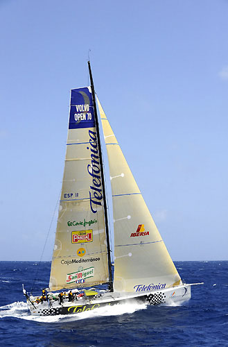 Telefonica Black passes through the scoring gate at Fernando de Noronha, on leg 1 of the Volvo Ocean Race. Photo copyright Rick Tomlinson / Volvo Ocean Race. 