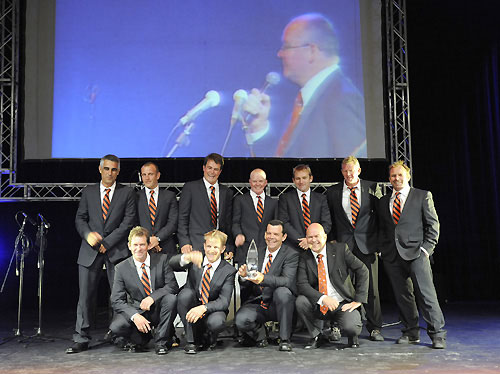 The crew of Ericsson 4 celebrate winning the Waterford Trophy for first place, at the leg 1 Prize Giving in Cape Town, South Africa. Volvo Ocean Race leg 1 Prize Giving Ceremony. Photo © Rick Tomlinson / Volvo Ocean Race.