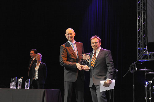 James Collett, Director of Commercial Solutions for Inmarsat left, presents Ericsson 4's Guy Salter from the Isle of Wight, UK, with the Media Crew Member award at the leg 1 prize giving ceremony in Cape Town, South Africa. The media crew member has been introduced for the first time to the Volvo Ocean Race, seeing the crewman shoot video, stills, write and record audio, capturing all of the life and action onboard the boats. Photo © Rick Tomlinson / Volvo Ocean Race.