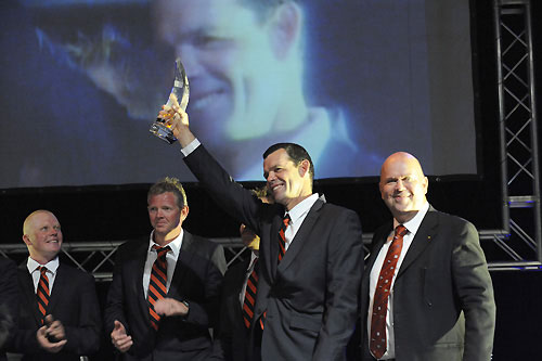 Ericsson 4 skipper Torben Grael holds aloft the Waterford Trophy for first place, as presnted by Anders Lindblad (right) - Managing Director Volvo Group Southern Africa at the leg 1 Prize Giving in Cape Town, South Africa. Volvo Ocean Race leg 1 Prize Giving Ceremony. Photo copyright Rick Tomlinson / Volvo Ocean Race.