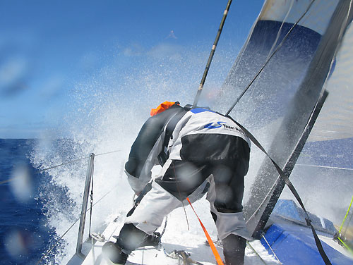 Watch leader Stu Wilson rolling a sheet during a sail change right after the Delta Lloyd turned north to Indian Ocean, on leg 2 of the Volvo Ocean Race, from Cape Town, South Africa to Cochin, India. Photo copyright Sander Pluijm / Team Delta Lloyd / Volvo Ocean Race.