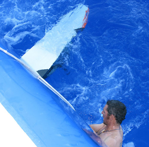 Pepe Ribes from Spain checking the broken daggerboard onboard Telefonica Blue. Photo copyright Gabriele Olivo / Telefonica Blue / Volvo Ocean Race.