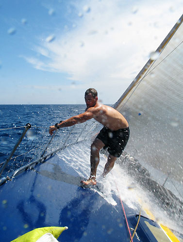 Bowman Scott Gray making his way back along the deck of Team Russia, on leg 3 of the Volvo Ocean Race, from India to Singapore. Photo copyright Sergey Bogdanov / Team Russia / Volvo Ocean Race.