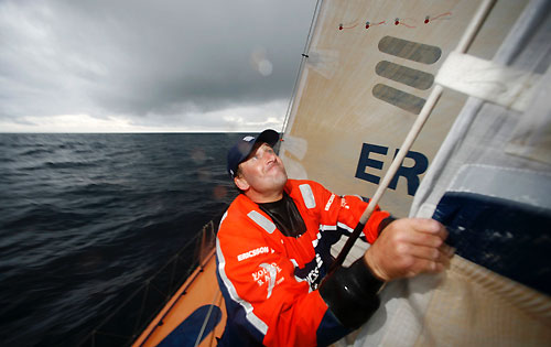 Anders Dahlsjo wrapping the staysail onboard Ericsson 3, on leg 4 of the Volvo Ocean Race from Singapore to Qingdao, China. Photo copyright Gustav Morin / Ericsson 3 / Volvo Ocean Race.