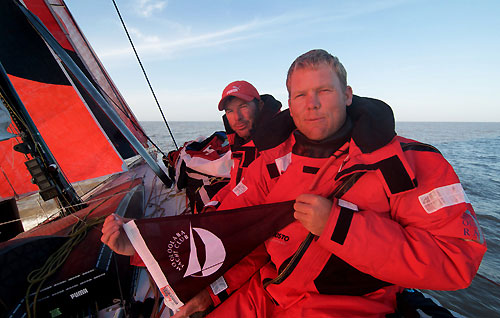 Casey Smith onboard PUMA Ocean Racing, with his local Mooloolaba Yacht Club flag from Queensland, Australia. Photo copyright Rick Deppe / PUMA Ocean Racing / Volvo Ocean Race.