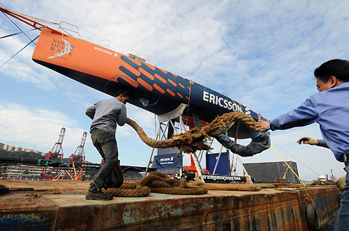 Ericsson 3 is moved by barge, down the coast of Taiwan from Keelung to Hualien where an 8 metre piece of the bow will be pulled out and replaced before they continue the remaining leg 4 joureny to Qingdao. Photo copyright Dave Kneale / Volvo Ocean Race.