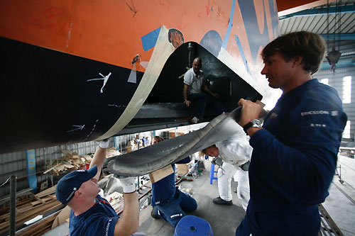 Ericsson 3's new bow piece fitted and the team undertake final repairs before the boat was re-launched to continue leg 4 from Taiwan to Qingdao. Photo copyright Gustav Morin / Ericsson 3 / Volvo Ocean Race.