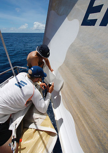 Sail repairs onboard Ericsson 4, in the Doldrums, on leg 5 of the Volvo Ocean Race. Photo copyright Guy Salter / Ericsson 4 / Volvo Ocean Race.