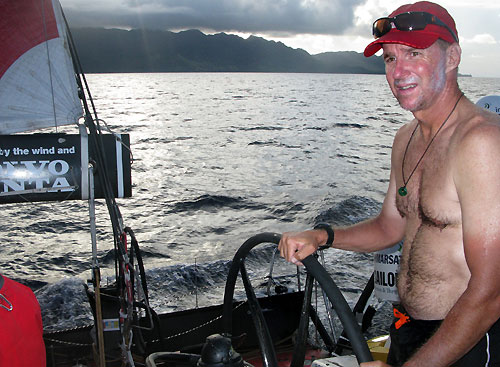 Skipper Ken Read helming PUMA Ocean Racing past Viti Levu, Fiji, on leg 5 of the Volvo Ocean Race, from Qingdao to Rio de Janeiro. Photo copyright Rick Deppe / PUMA Ocean Racing / Volvo Ocean Race.