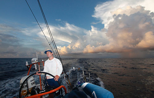 Brad Jackson escaping rain clouds, onboard Ericsson 4, on leg 5 of the Volvo Ocean Race, from Qingdao to Rio de Janeiro. Photo copyright Guy Salter / Ericsson 4 / Volvo Ocean Race.