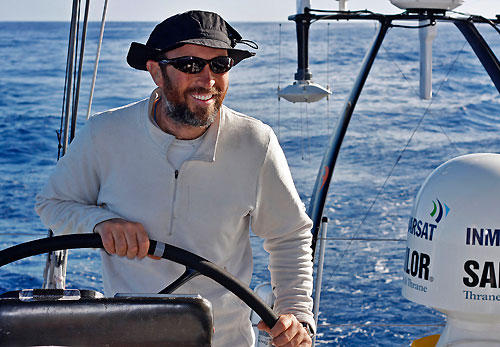 Tom Braidwood helming in his Birthday hat, onboard Green Dragon, on leg 5 of the Volvo Ocean Race, from Qingdao to Rio de Janeiro. Photo copyright Guo Chuan / Green Dragon Racing / Volvo Ocean Race.