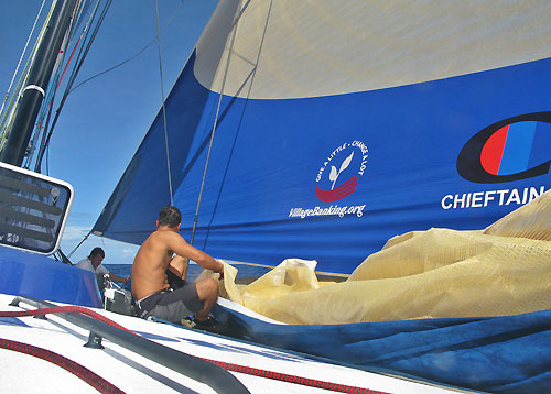 The crew of Delta Lloyd preparing a sailchange. Bowmen Gerd-jan Poortman and Morgan White take down the R2, while the Code Zero is being unfurled, on leg 6 of the Volvo Ocean Race, from Rio de Janeiro to Boston. Photo copyright Sander Pluijm / Team Delta Lloyd / Volvo Ocean Race.
