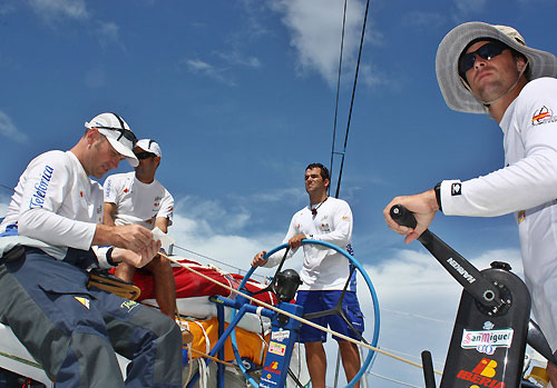 Tom Addis reads the report, onboard Telefonica Blue, on leg 6 of the Volvo Ocean Race, from Rio de Janeiro to Boston. Photo copyright Gabriele Olivo / Telefonica Blue / Volvo Ocean Race.