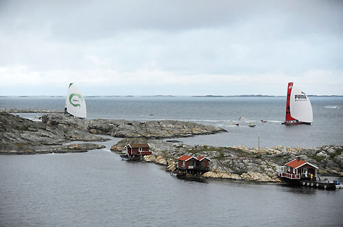 PUMA Ocean Racing, skippered by Ken Read (USA) finish second on leg 8 from Galway to Marstrand at 03:04:46 GMT. Chasing PUMA is Green Dragon, skippered by Ian Walker (GBR), who finish third at 03:05:40 GMT, June 11, 2009. Photo copyright Rick Tomlinson / Volvo Ocean Race.