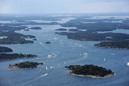 Perfect weather and hundreds of spectator boats turn out, for the Stockholm in-port race. Photo copyright Rick Tomlinson / Volvo Ocean Race.