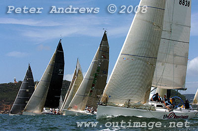 Looking down a line of starters with Barrenjoey Head and lighthouse in the background after the start of the Pittwater to Pittwater Ocean Race 2008.