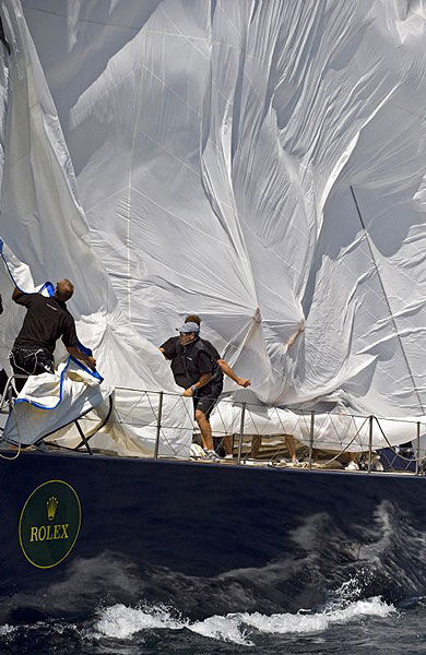 Dropping spinnaker onboard Thomas Bscher's Open Season on the second day of racing during the Giraglia Rolex Cup 2008.