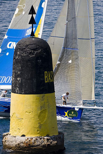 Simcic Igor's Esimit Europa passing by the cardinal markv off St Tropez after the start of the 56th Giraglia Race.