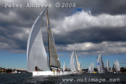 Syd Fischer's TP52 Ragamuffin ahead of Chris Dare's Corby 49 Flirt from Victoria and Matthew Short's IRC52 Shortwave, after the start of the 2008 Sydney to Gold Coast Yacht Race.