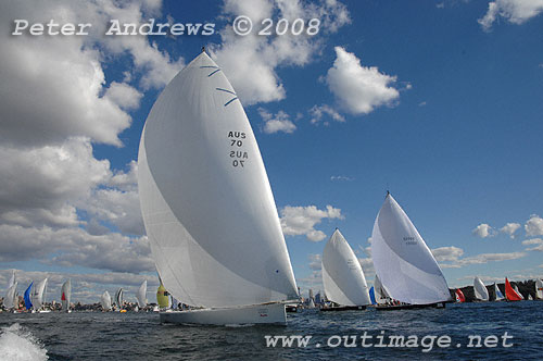 Syd Fischer's TP52 Ragamuffin left ahead of Bob Steel's TP52 Quest right; and Graeme Wood's JV52 Wot Now, all under spinnaker and racing towards the heads after the start of the 2008 Sydney to Gold Coast Yacht Race.