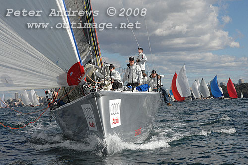 Geoff Boettcher's Reichel Pugh 47 Secret Mens' Business 3 under spinnaker and running down to the heads after the start of the Sydney to Gold Coast Yacht Race.