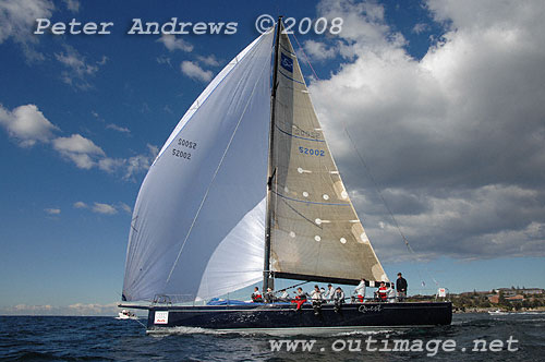 Bob Steel's TP52 Quest approaching the heads under spinnaker.