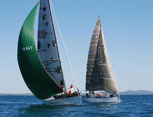 Rick Morgan's Custom MBD 40 Dream Lover to the right of Tam Faragher's Beneteau First 44.7 Ultimate Positioning, out on Moreton Bay after the start of the Brisbane to Keppel Tropical Yacht Race. Photo copyright Suellen Hurling.
