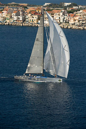 Andres Soriano's Alegre in the Strait of Messina with Capo Peloro in the background. Photo copyright ROLEX and Kurt Arrigo.