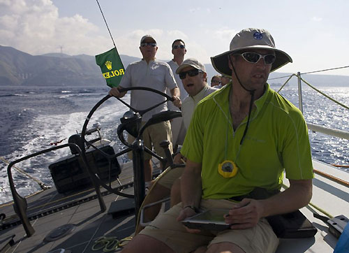 Onboard Jim Swartz's STP65 Moneypenny, crossing the Straits of Messina during the Rolex Middle Sea Race 2008. From left to right are Jim Swartz, Gavin Brady, Rodney Daniel and Matt Wachowicz. Photo copyright ROLEX and Daniel Forster.