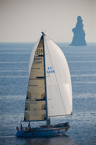 Marco Bertozzi's Super Atax (ITA) passing La Cana Island during the Rolex Middle Sea Race 2008. Photo copyright ROLEX and Kurt Arrigo.