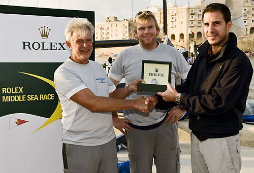 Andres Soriano and Will Best from Alegre with Malcolm Lowell Jr after winning Line Honours for the Rolex Middle Sea Race 2008. Photo copyright ROLEX and Kurt Arrigo.