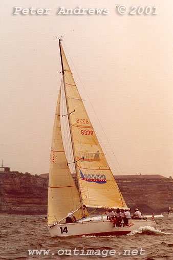 Ed Psaltis and Bob Thomas won the stormswept
1998 Sydney Hobart with an earlier Hicks 34, AFR Midnight Rambler<, pictured here under a bushfire coloured
sky at the start of the 2001 Sydney Hobart. Photo copyright Peter Andrews.