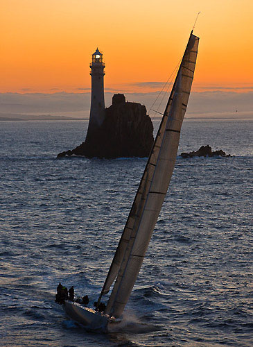 Niklas Zennstrom's JV 72 Ran 2 at the Fastnet Rock, during the Rolex Fastnet Race 2009. Photo copyright Rolex - Carlo Borlenghi.