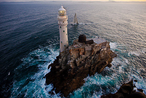 Niklas Zennström’s JV 72 Rán 2, at Fastnet Rock, during the Rolex Fastnet Race 2009. Photo copyright Rolex, Carlo Borlenghi.